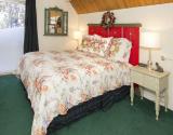 Downstairs bedroom with King bed & TV
